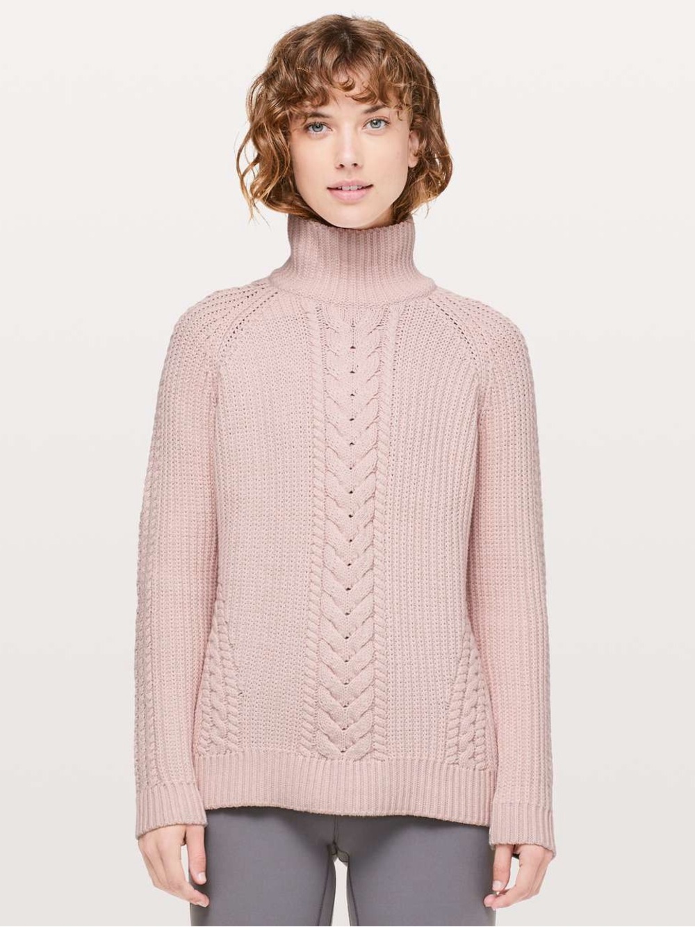 Lululemon Bring The Cozy Turtleneck in a soft misty pink cable knit